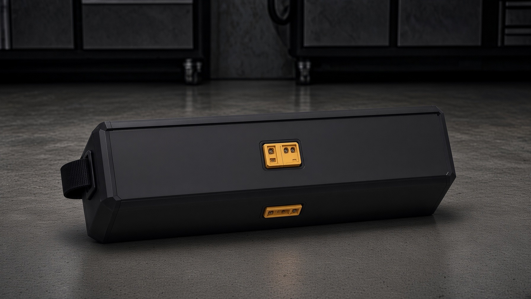 59-pound 8.5 kWh semi-solid NMC+ battery pack with yellow QS8 females centered on the bottom and long side, wide haul strap on the end