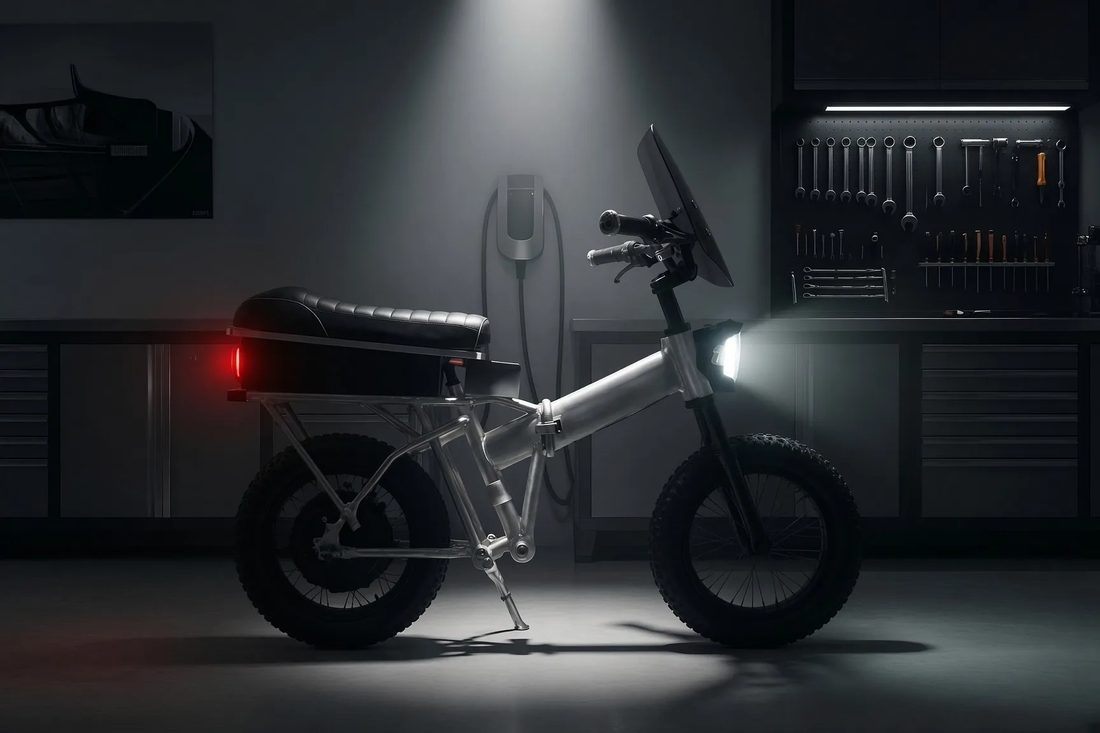 Puca folding electric motorcycle, right-side workshop view